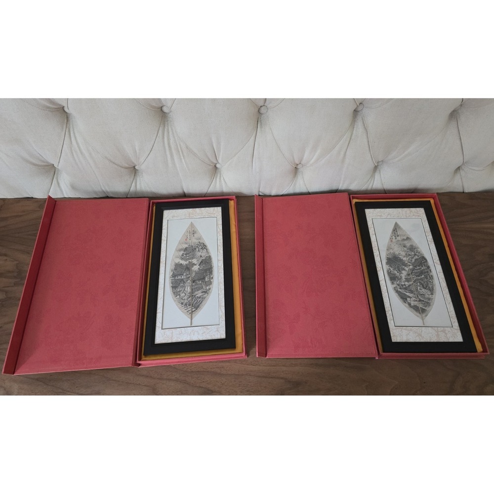 Pair of framed Asian leaf art paintings in presentation boxes